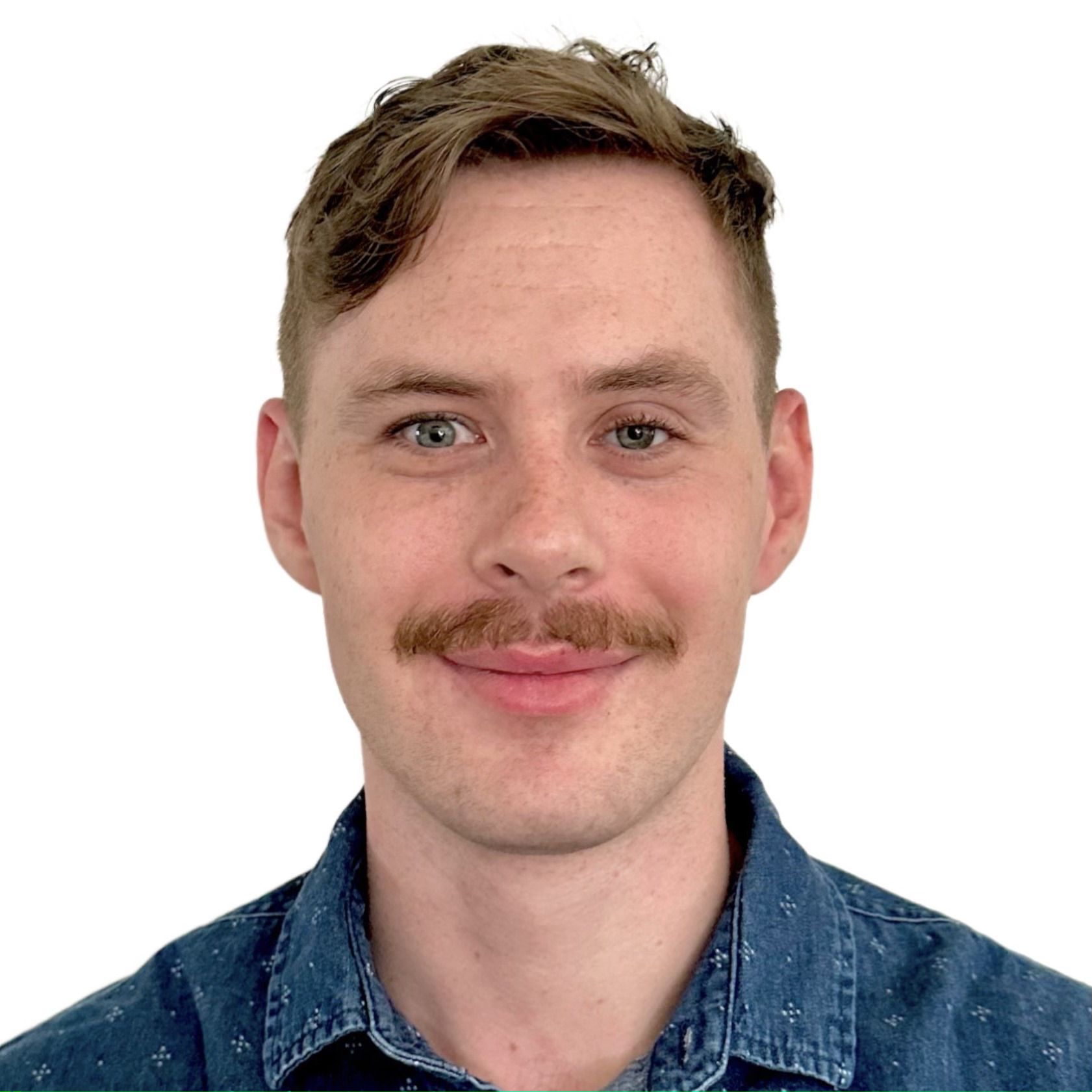 Headshot of Ross Minor in front of a white background.